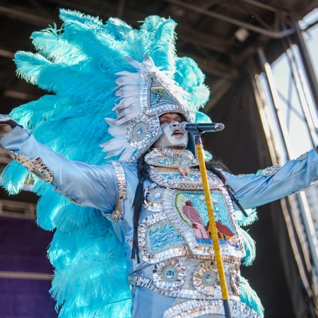 Flagboy Giz & The Wild Tchoupitoulas perform on day two of French Quarter Festival 2025.