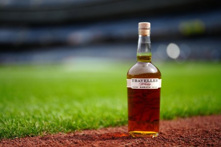 Traveller Whiskey bottle on a baseball field