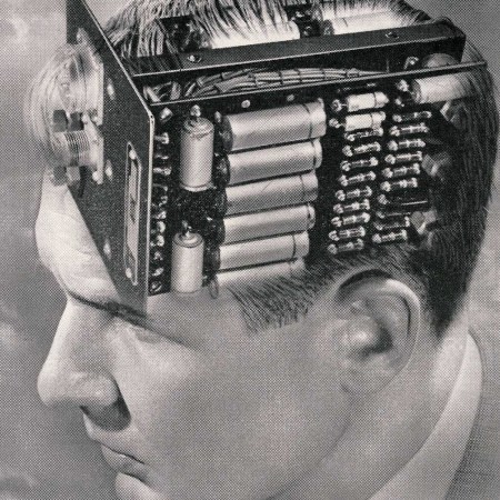 An illustration of a man's head with a circuit board attached