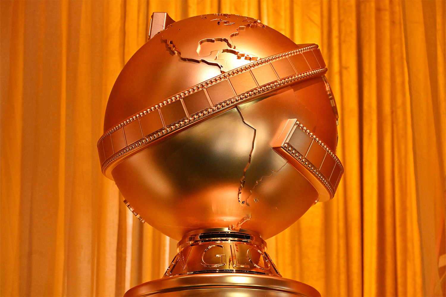 A Golden Globes statue at the award ceremony. The Globes just announced a new category for 2026: Best Podcast.