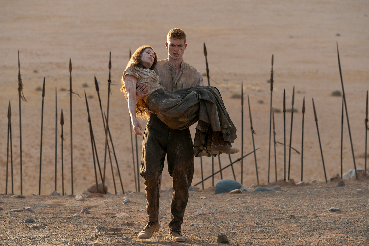Josha Stradowski as Rand al'Thor and Rosamund Pike as Moiraine Damodred in "The Wheel of Time"