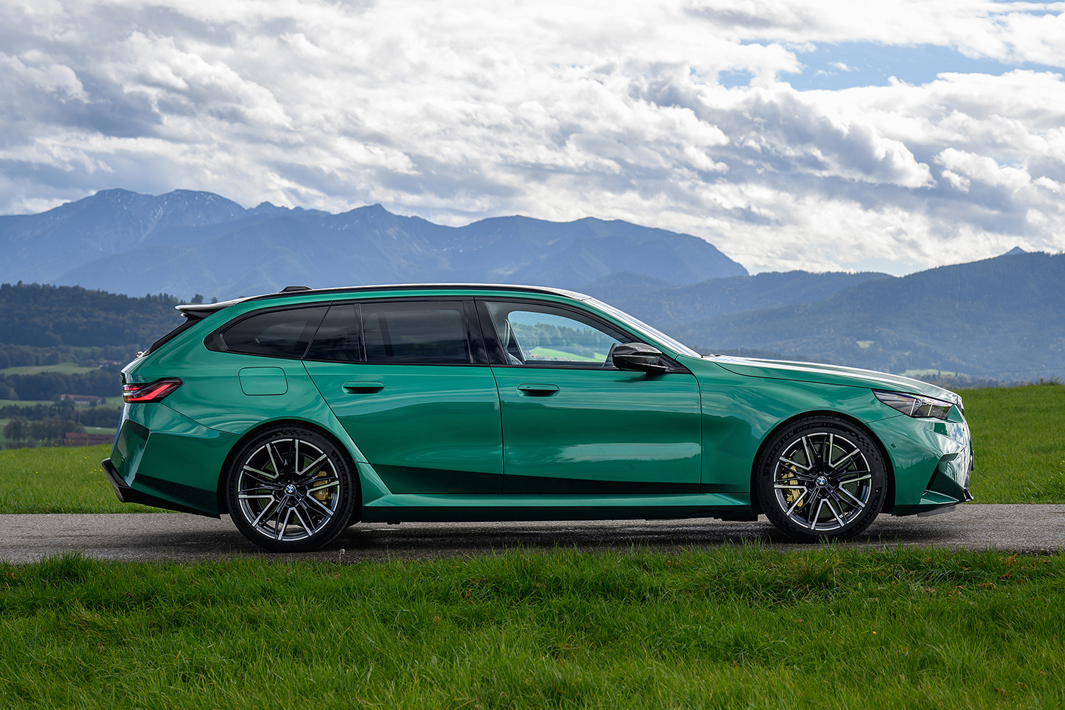 2025 BMW M5 Touring, a wagon variant that's now available in the U.S., seen here in green