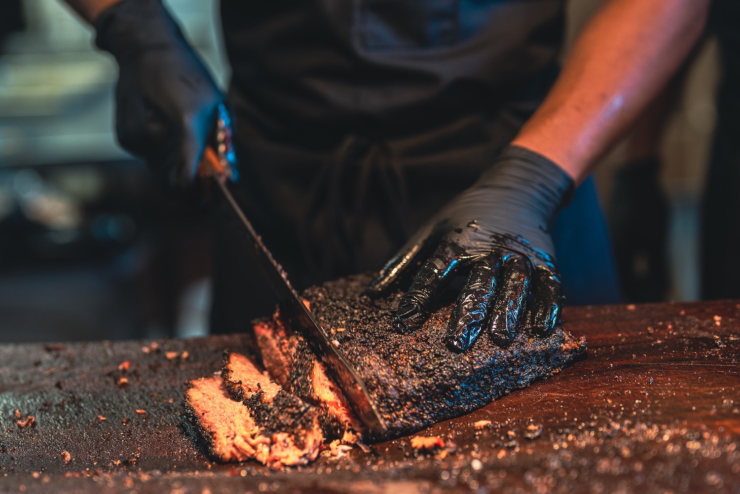 BBQ Chef Cuts Deliciously Tender Smoked Brisket Slices
