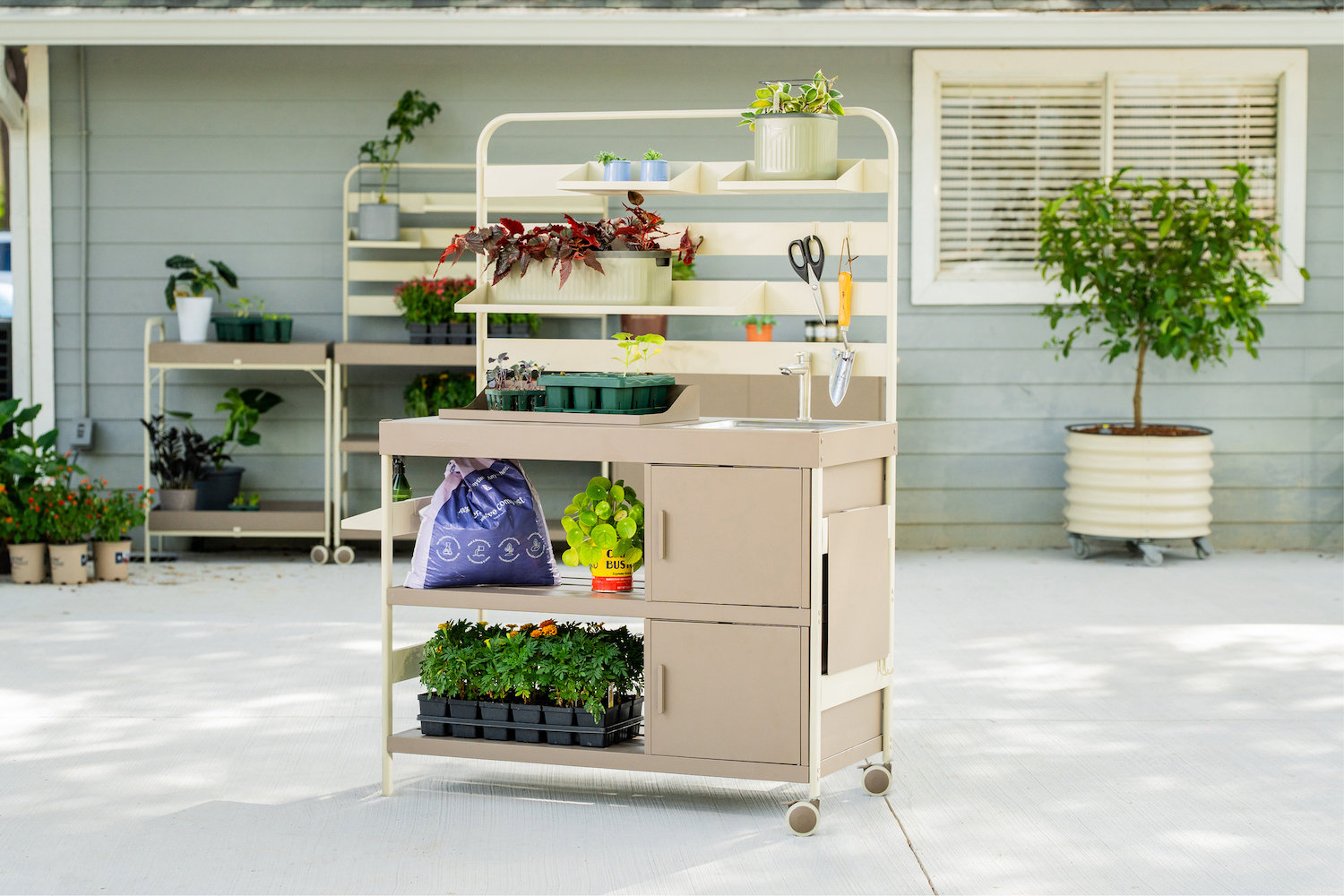 vego's garden Sink Station with Cabinet Storage on paved outdoor patio
