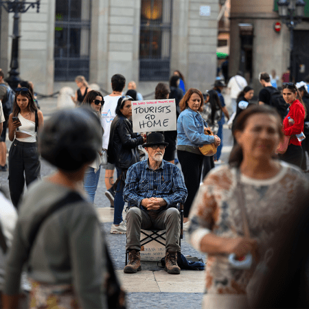 An activist in the Plaza de San Jaime in Barcelona