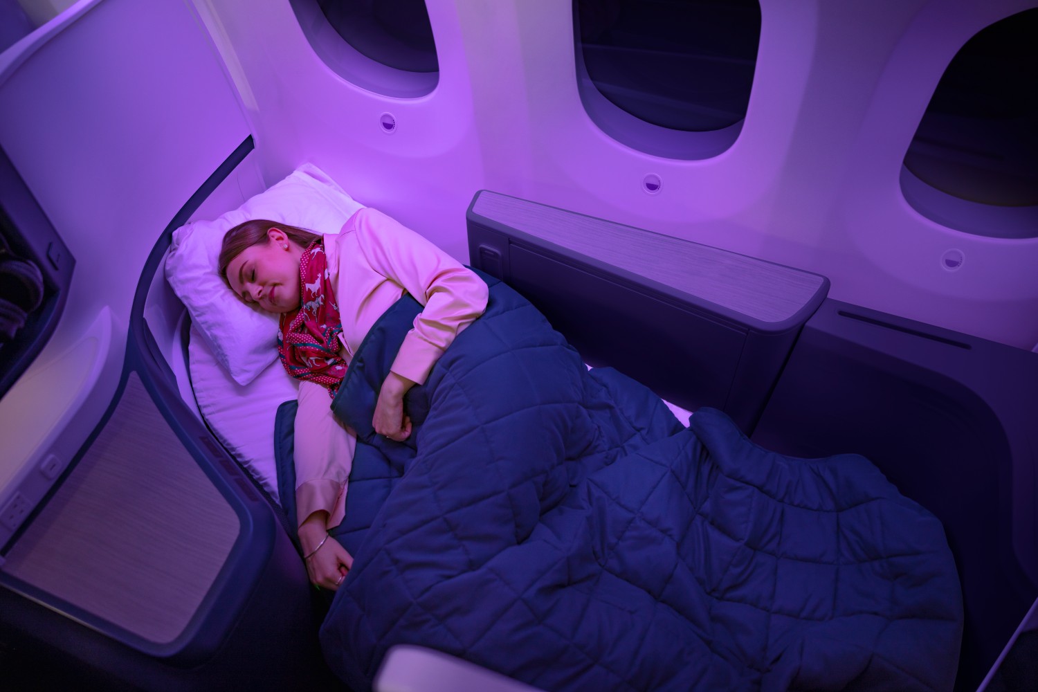 Woman sleeping on a flight