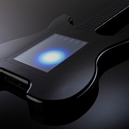 Guitar with glowing orb inside