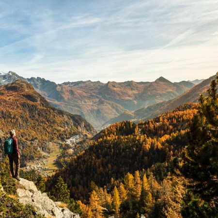 A person hiking on a scenic route. We take a look at how some hikers are turning to AI for routes and directions.