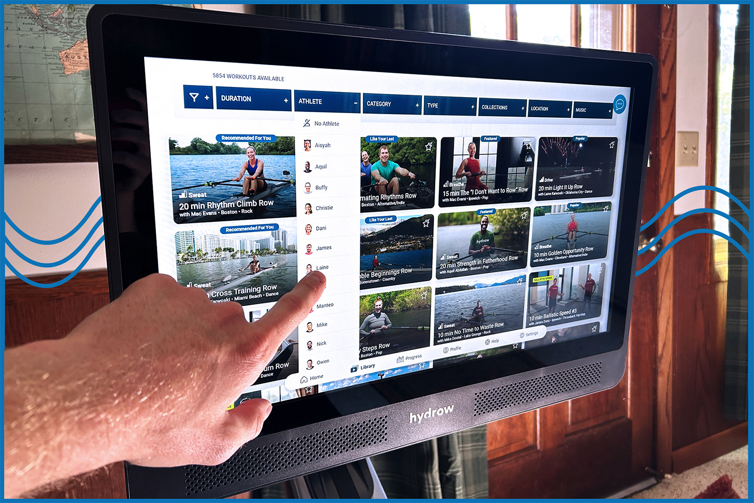 The screen on a Hydrow rowing machine showing the 5,000+ classes that are available