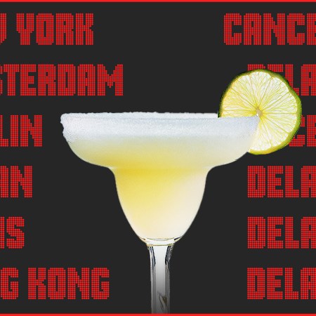 An image of a margarita cocktail in front of a departures board at an airport
