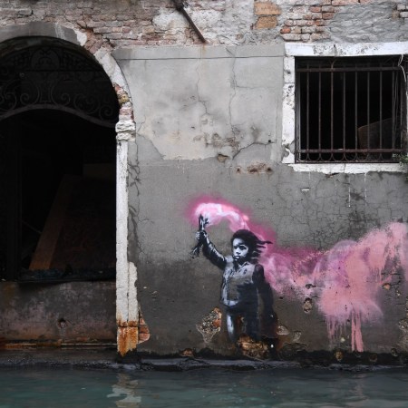 Banksy mural on a wall in Venice
