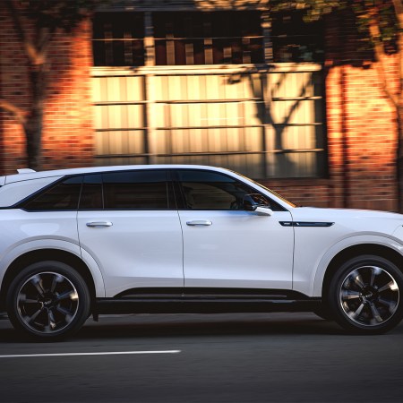 The 2026 Cadillac Escalade iQ, the new electric version of the iconic SUV, seen here in profile in white