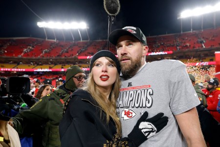 Taylor Swift celebrates with Travis Kelce #87 of the Kansas City Chiefs after defeating the Buffalo Bills 32-29 in the AFC Championship Game