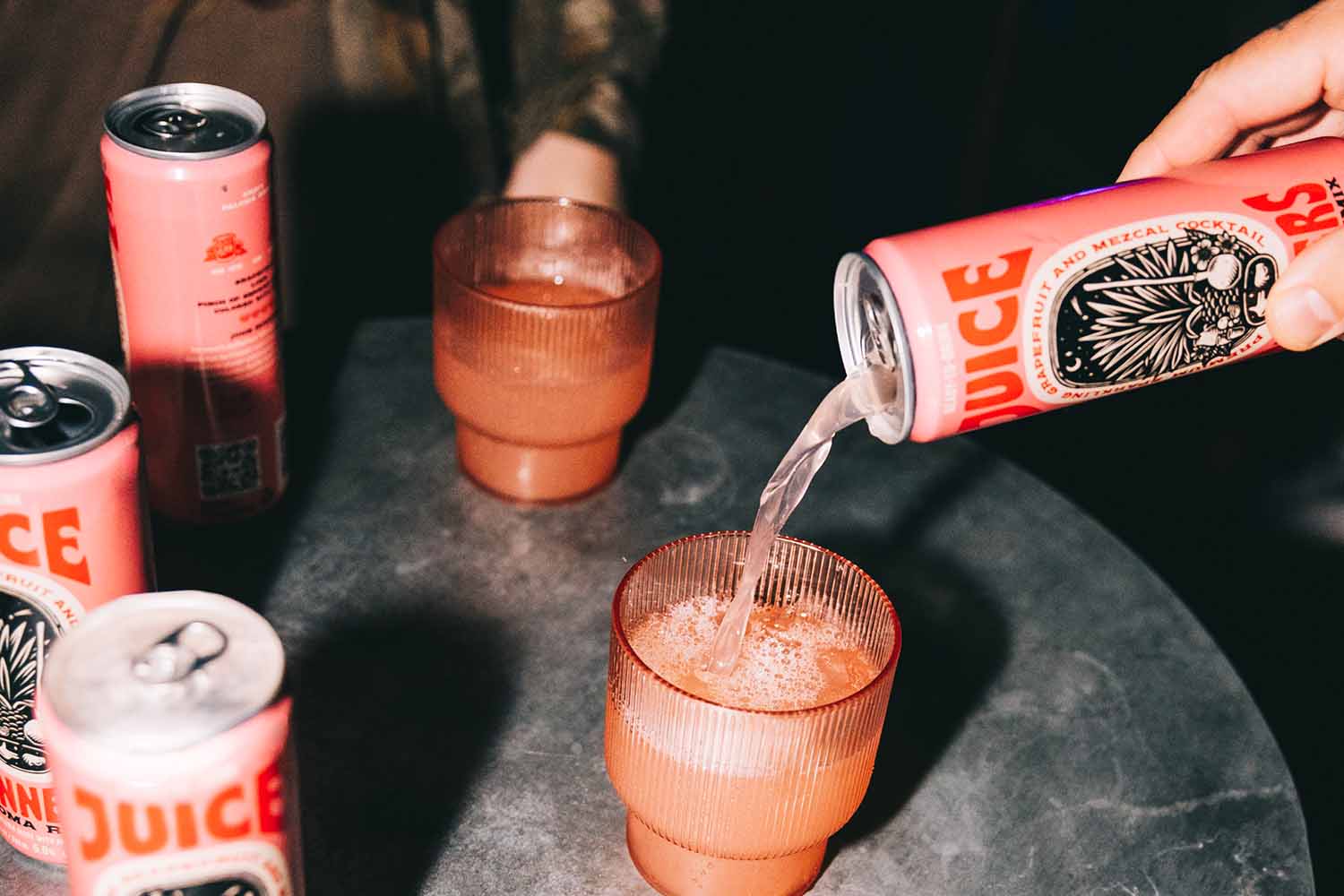 Juice Runners being poured from a can into a glass