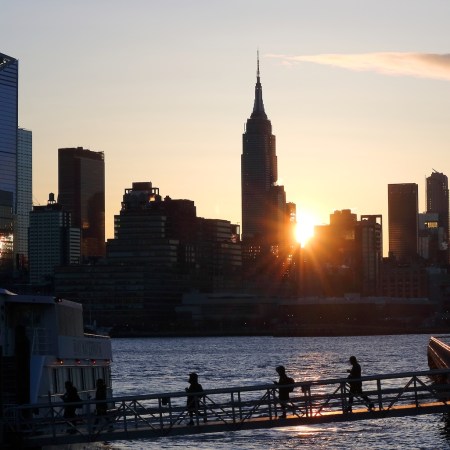 The sun rising over New York City. We discuss seven habits that can lead to a healthier workday.