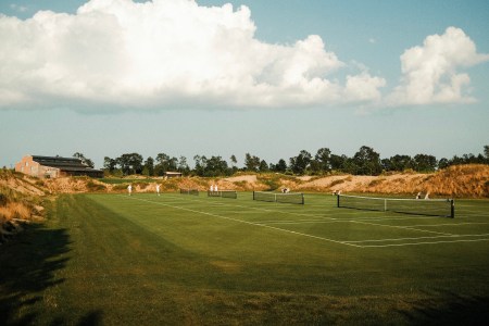 A view of Sand Valley Resort's outdoor grass tennis courts.
