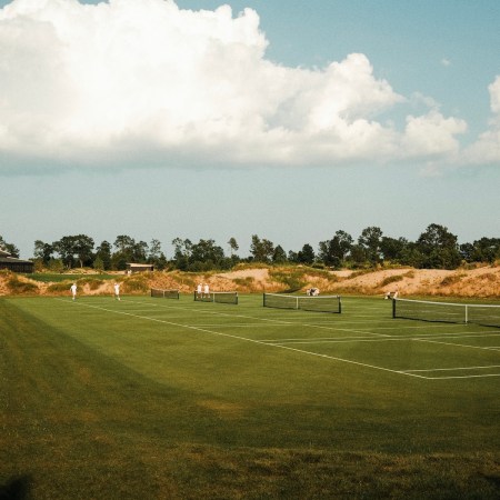 A view of Sand Valley Resort's outdoor grass tennis courts.