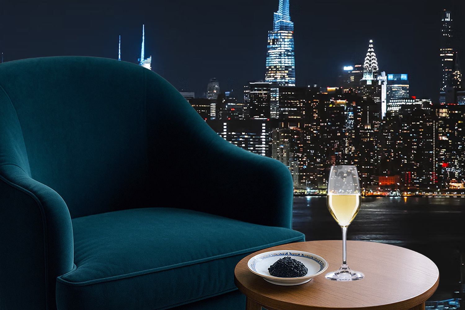 a glass of champagne on a table next to a plush chair overlooking a city skyline