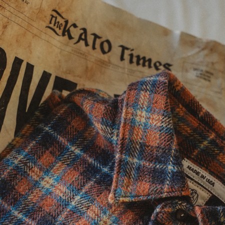 Flannel on top of a newspaper