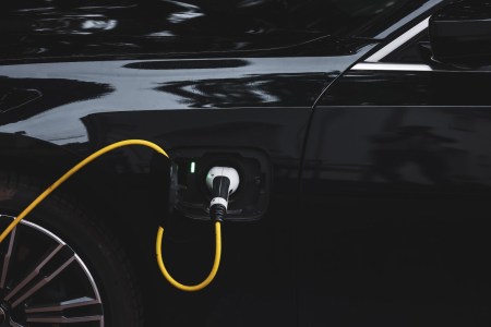 Electric vehicle being charged