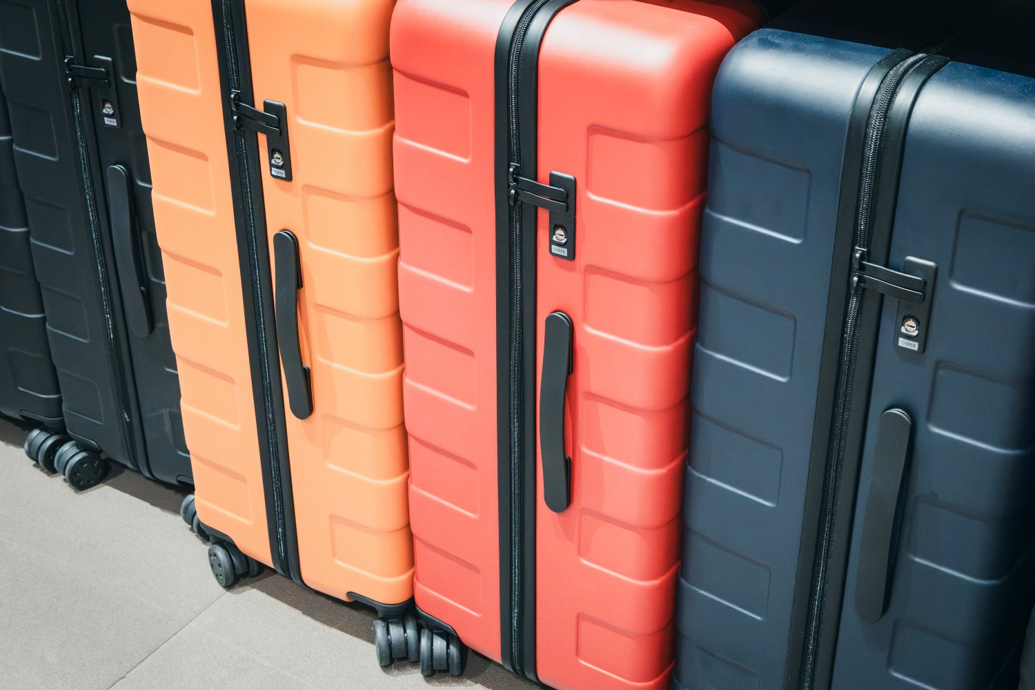 Similar luggage in a row