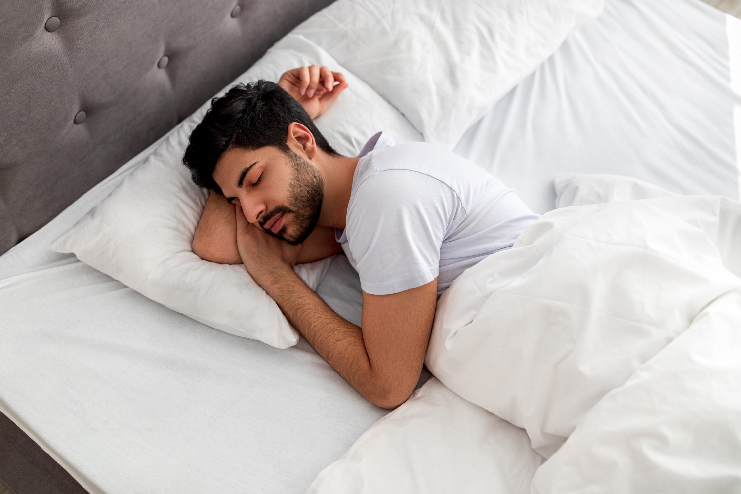 A bearded man sleeping