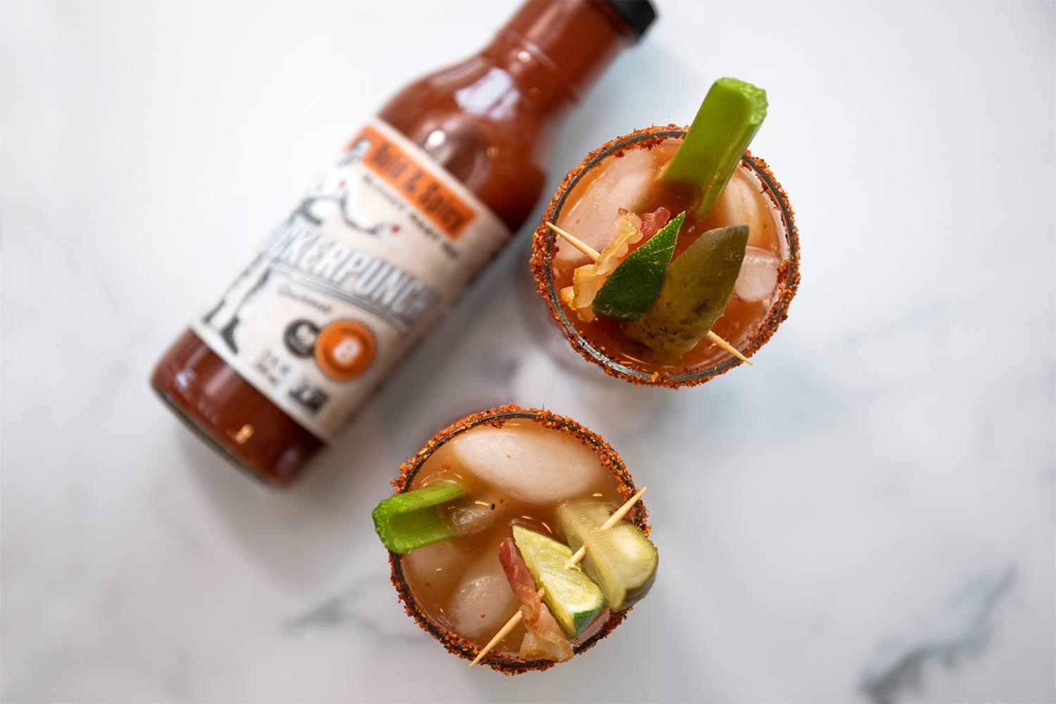Two Bloody Marys on a table