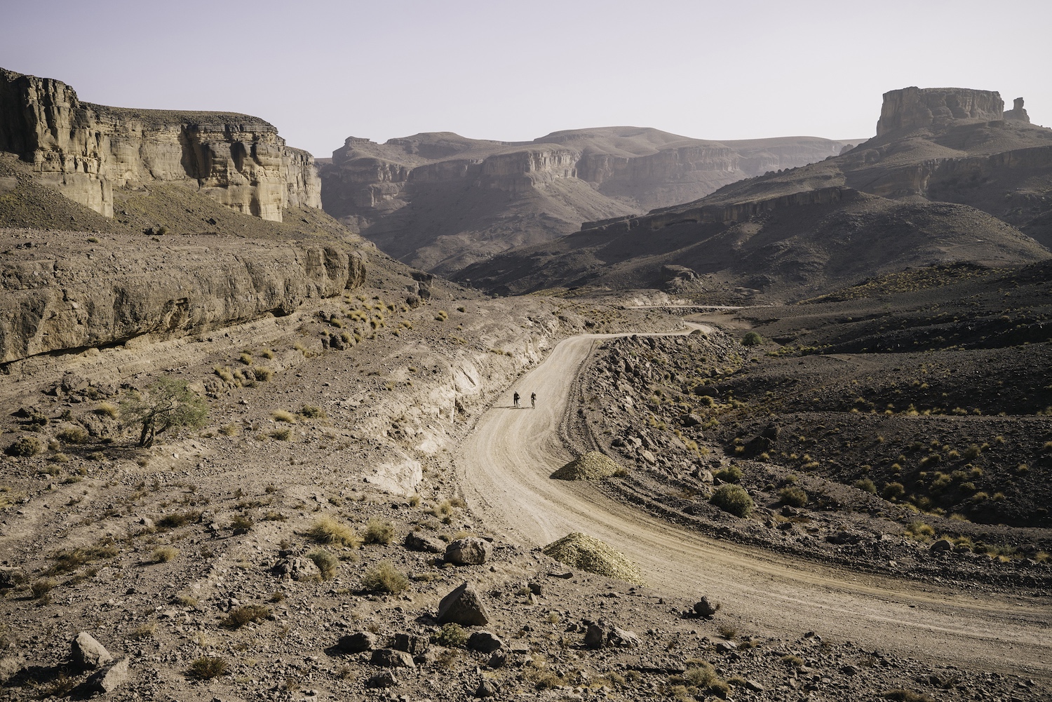 An aerial view of two bikers in rural Morocco.