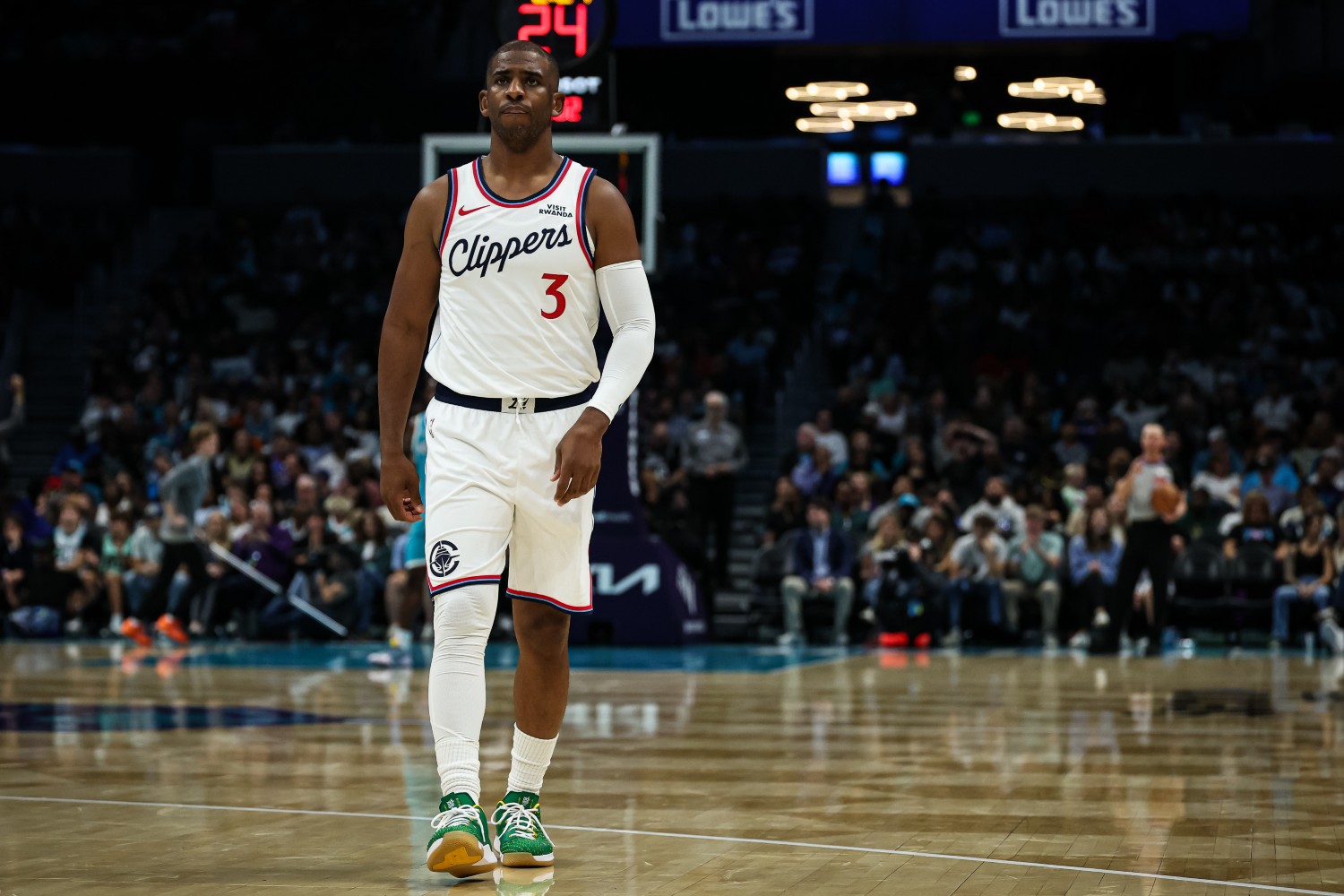 Chris Paul walking on a basketball court