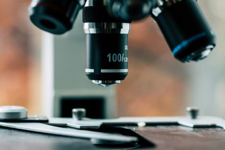 Microscope looking at slide