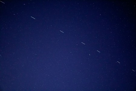 Satellites in the night sky. Experts are warning about the growing risks space junk poses to air travel.