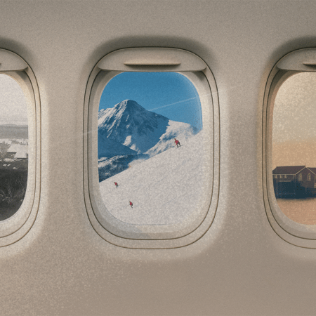 Three airplane windows with different views out of them, including tents, mountains and a coastal town