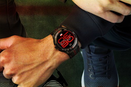 The TAG Heuer Connected Calibre E5 x Formula 1 Edition watch on a man's wrist