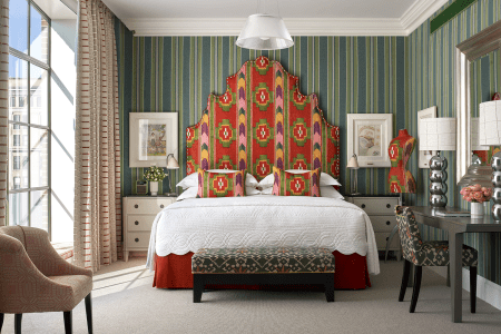 A communal interior space at a Firmdale hotel in New York City, showcasing curated, vibrant art and design details.
