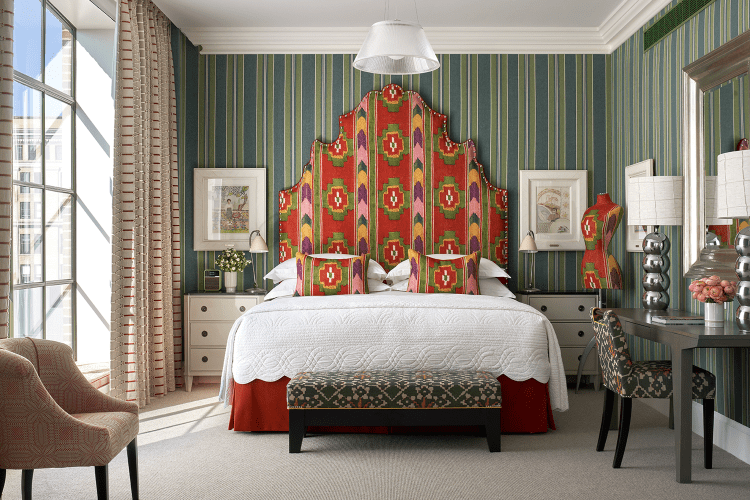 A communal interior space at a Firmdale hotel in New York City, showcasing curated, vibrant art and design details.