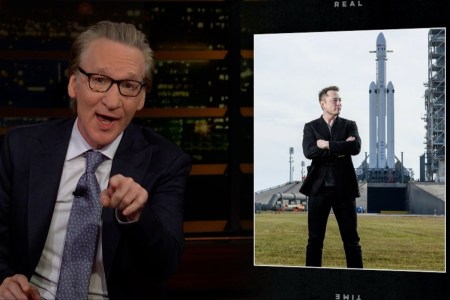 Bill Maher pointing with a photo of Elon Musk in the background
