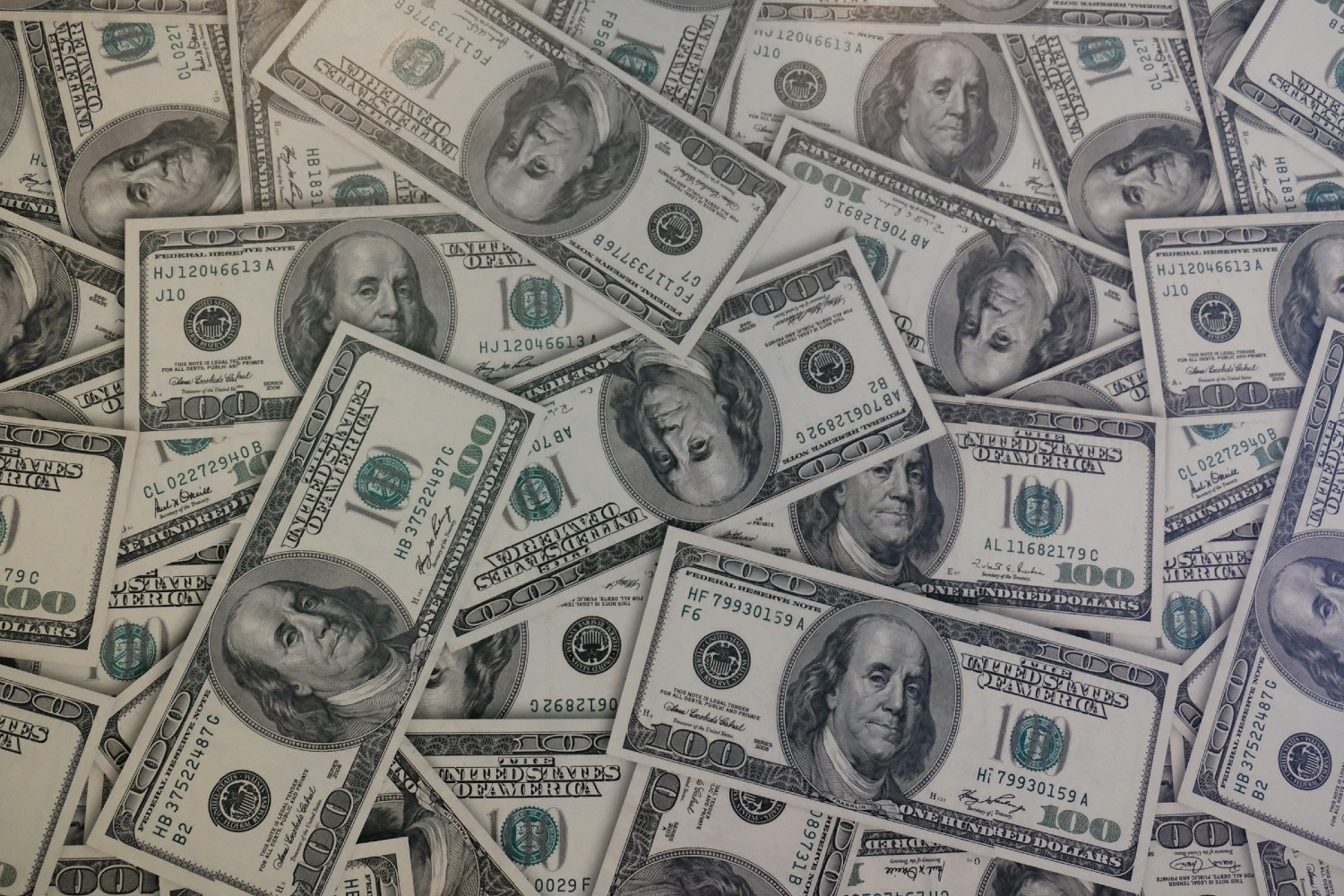 Pile of hundred dollar bills