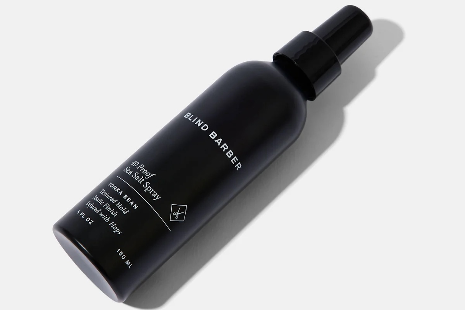 a bottle of sea salt spray on a white background