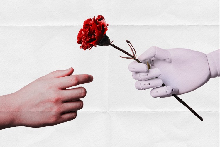 A human hand extending to reach for a rose being given by a robot hand