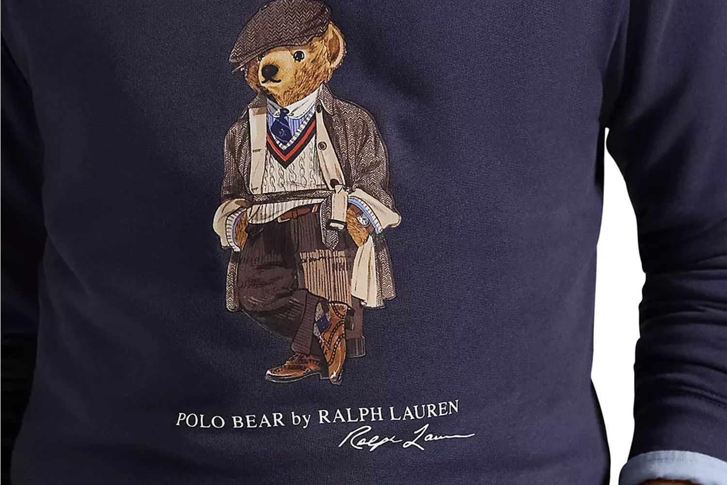 A Polo Bear graphic on a purple sweatshirt