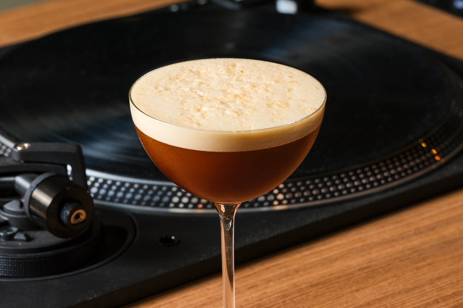 Espresso Martini in front of a DJ record deck