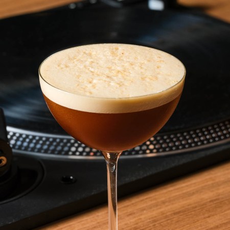 Espresso Martini in front of a DJ record deck