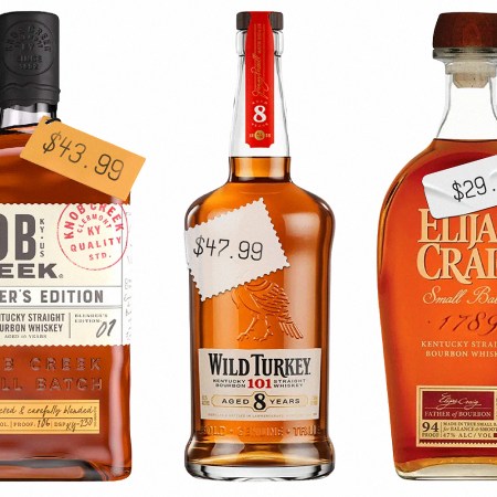 bottles of knob creek, wild turkey 101 8 year and elijah craig small batch lined up on a white background