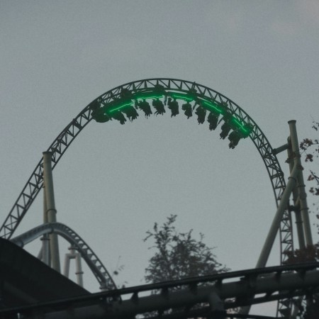 A rollercoaster going upside down.