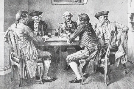 a black and white illustration of 18th-century men around a table drinking