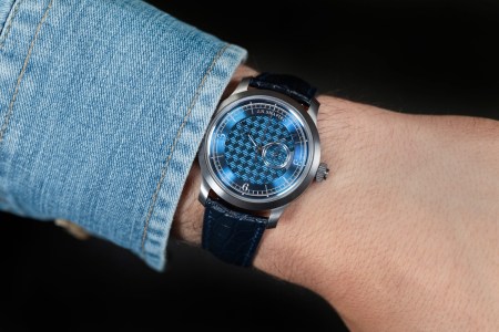 a model wearing a blue face J.N. Shapiro watch