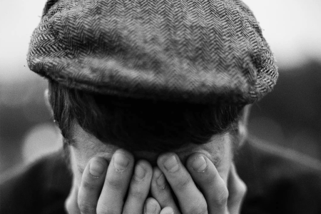 lifestyle image from brixton of man wearing hat