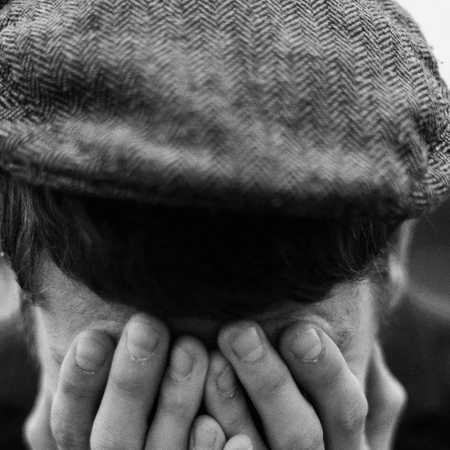 lifestyle image from brixton of man wearing hat