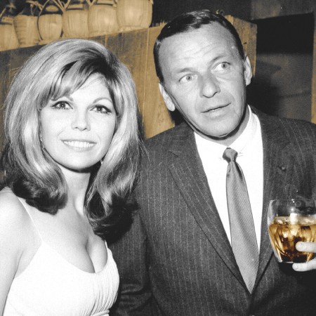 Frank Sinatra enjoys a cocktail at an event with his daughter singer Nancy Sinatra in circa 1967. (Photo by Earl Leaf/Michael Ochs Archives/Getty Images)