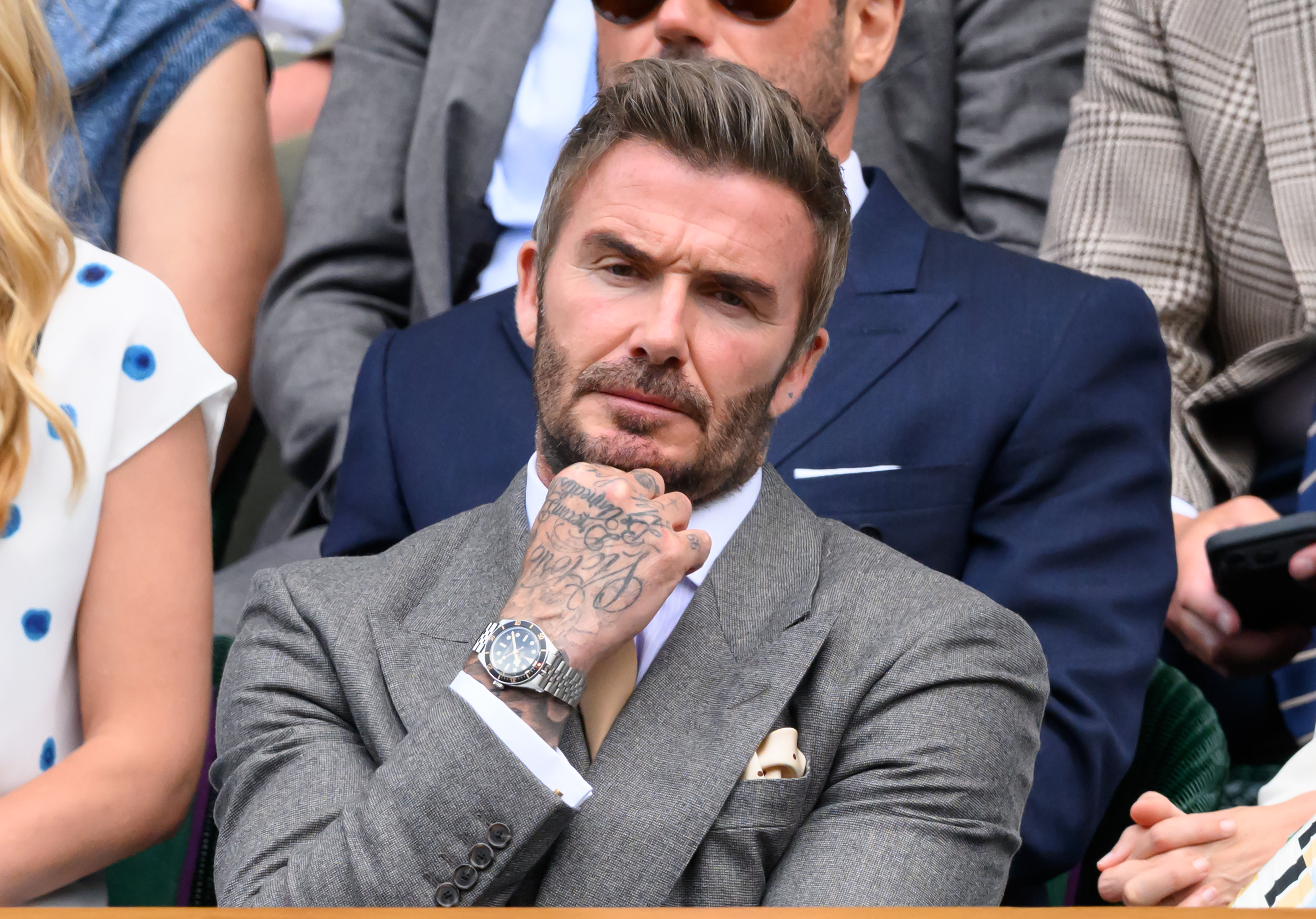 David Beckham watching a tennis match